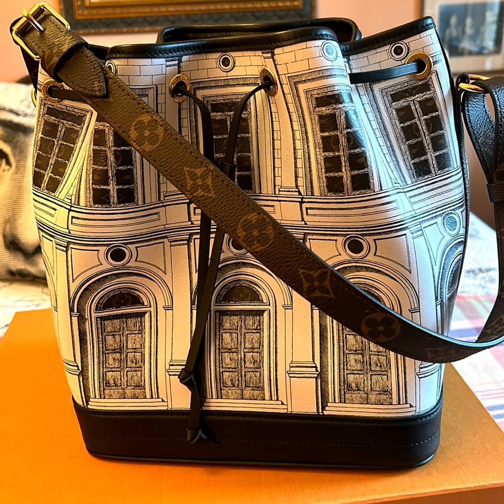 Authentic Nordstrom bought Louis Vuitton Fornasetti bucket bag never used